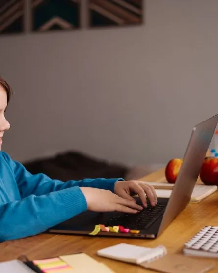 Online learning, boy using laptop for his classes